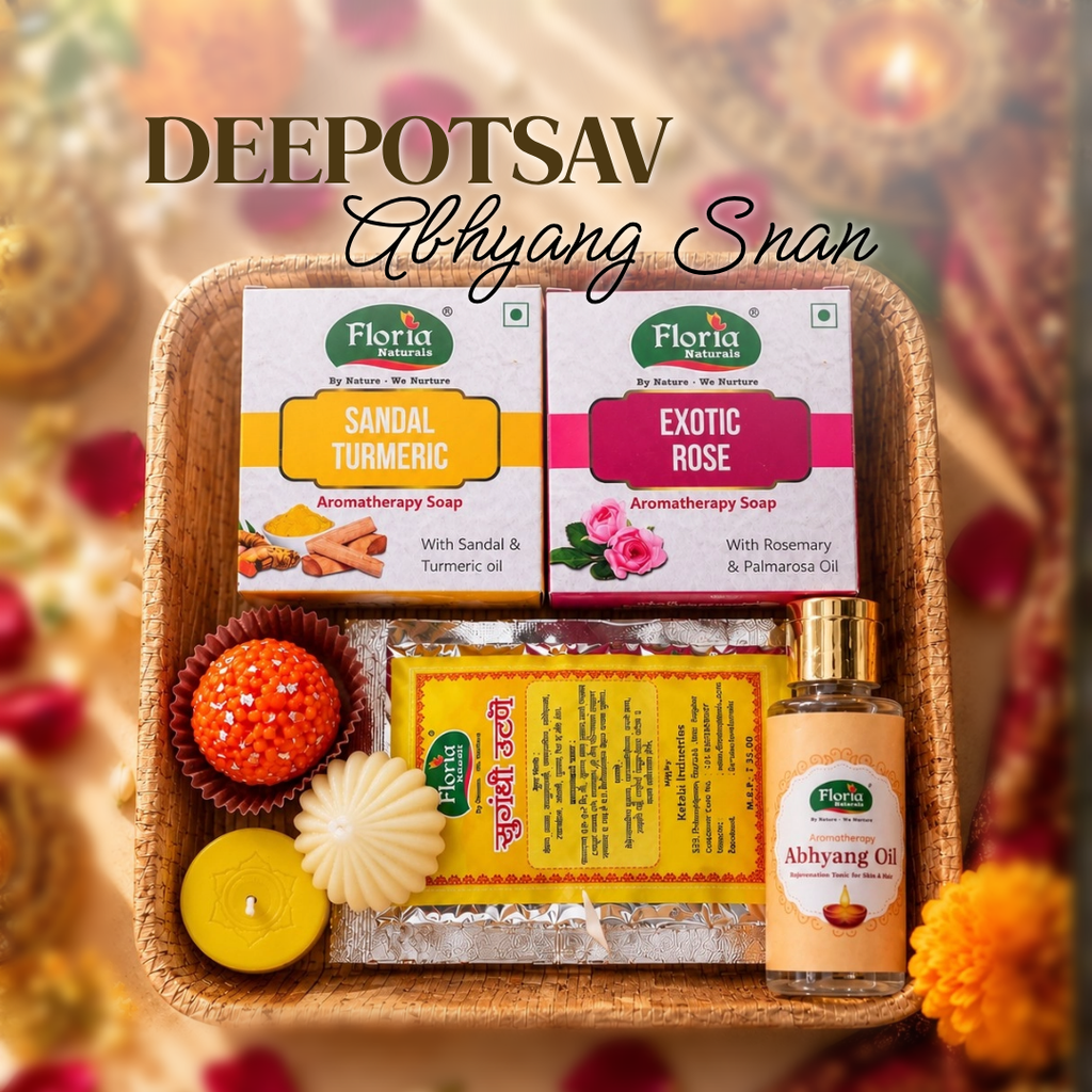 Abhyanga Snaan Grand Hamper: two soaps, utane, oil and three mithai candles on an arecanut plate