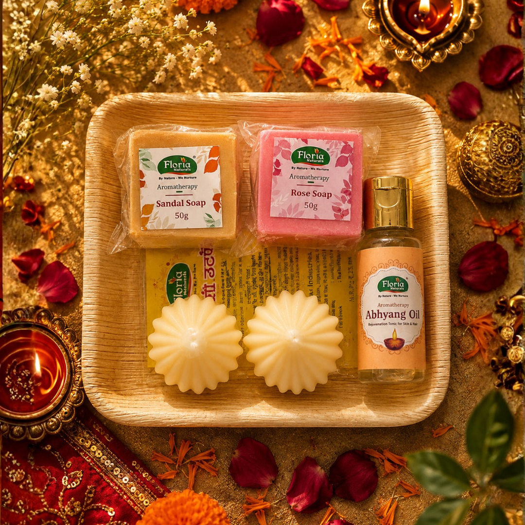 The Mini Snaan Thali: two 50g soaps, 30ml oil, utane and two candles on a small arecanut plate