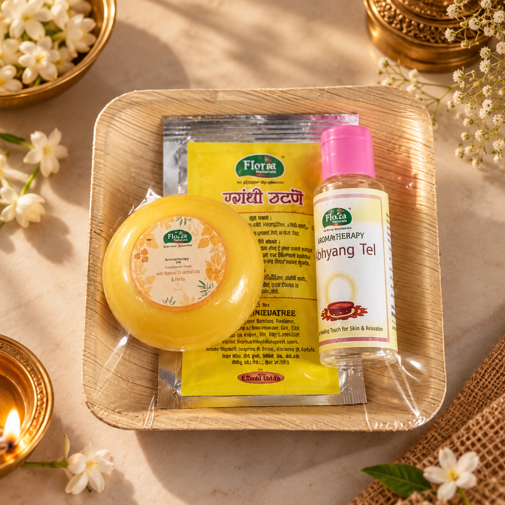 Abhyanga Snaan Trio Gift Set: Sandal Turmeric soap, Sugandhi Utane and Abhyanga Oil on an arecanut plate